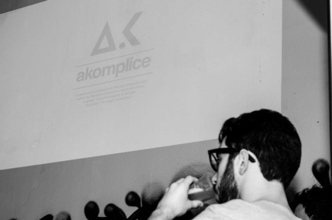 Akomplice logo on wall