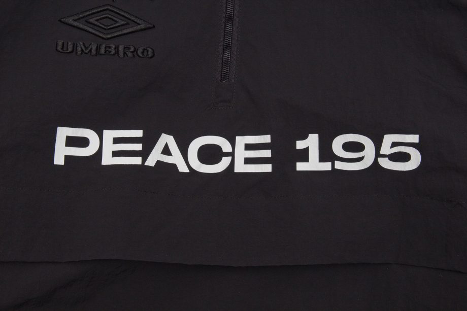 AK + UMBRO - WORLD PEACE NYLON 1/4 ZIP